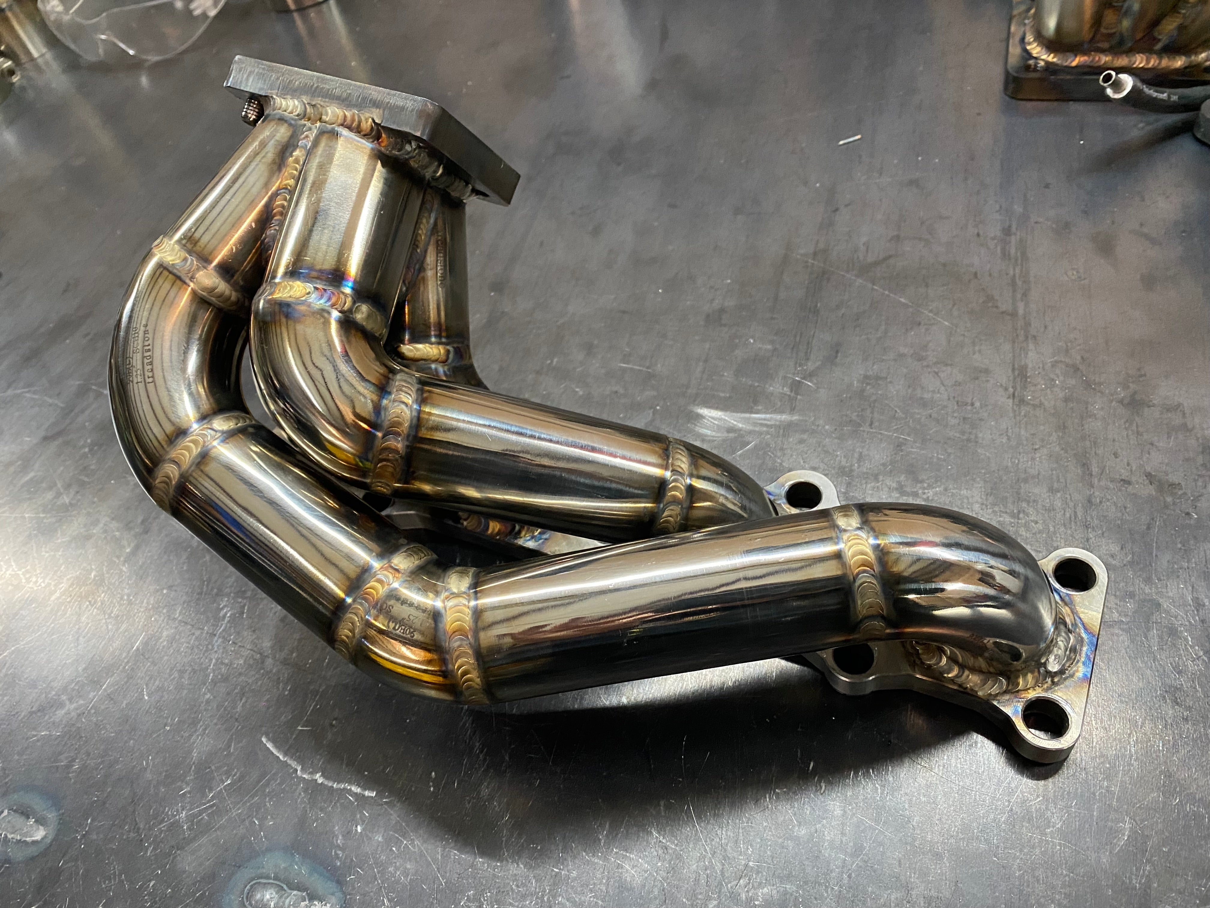 DarkLight Fabrication turbo exhaust manifold for Mazda Miata 1.8L engine