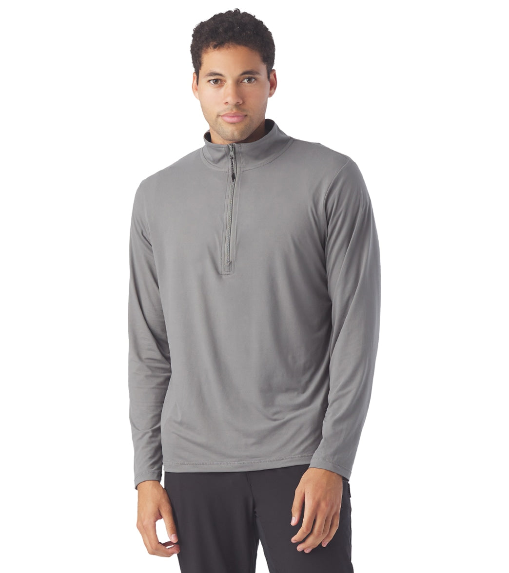 Glyder Men's Yoga Jacket in Smoke Grey, designed for optimal comfort and flexibility during yoga sessions. This stylish and functional hoodie features a quarter-zip front and long sleeves, perfect for layering in cooler weather. Ideal for yoga enthusiasts seeking quality and performance