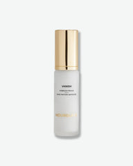 Skincare bottle labeled 'Vanish' with a gold cap on a white background